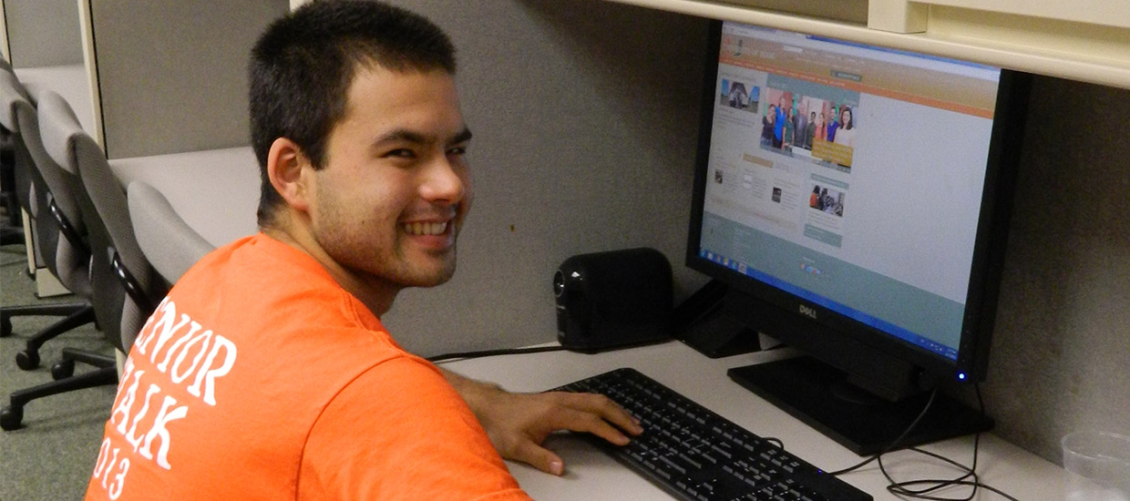 Student using a computer at the Camner Center