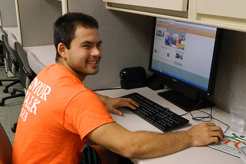 Student using a computer at the Camner Center